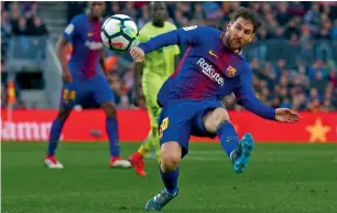  ?? AP ?? Lionel Messi during a La Liga match against Getafe at the Camp Nou. —