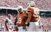  ?? Associated Press ?? Texas quarterbac­k Tyrone Swoopes celebrates his touchdown with offensive lineman Connor Williams against Oklahoma on Oct. 10, 2015, in Dallas.