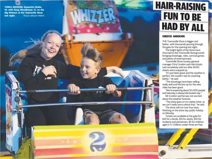  ?? Picture: WESLEY MONTS ?? THRILL- SEEKERS: Samantha Noble, 18, with Doug Woodhouse, 11, on the Big Whizzer at the Townsville Show last night.