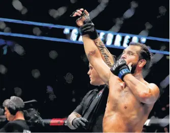  ?? REUTERS ?? Jorge Masvidal of the Ultimate Fighting Championsh­ip celebrates his win against Darren Till in March 2019.