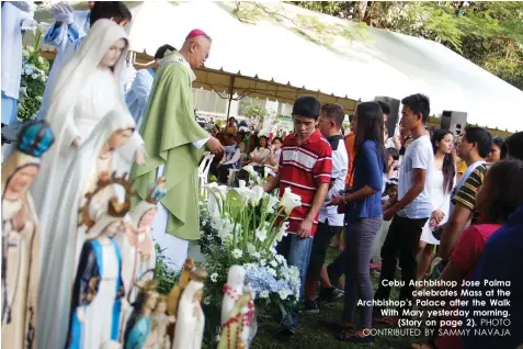  ?? PHOTO CONTRIBUTE­D BY SAMMY NAVAJA ?? Cebu Archbishop Jose Palma
celebrates Mass at the Archbishop’s Palace after the Walk With Mary yesterday morning.
(Story on page 2).