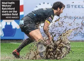  ?? NEWS IMAGES ?? Mud bath: Wolves’ Ratchford stars on the sodden field