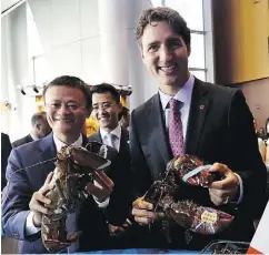  ?? MAPLE LEAF STRATEGIES ?? Prime Minister Justin Trudeau and Alibaba founder Jack Ma hold Clearwater lobster in Hangzhou, China, last year.