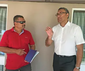  ?? Photo: Charles Chambers ?? From left: Prospector Parvindra Narayan with Kontiki Stockbroki­ng Managing Director Griffin Emose at the public offering for sale of shares for Port Denarau Marina at the Tanoa Waterfront on July 17, 2019.