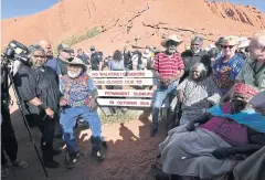  ?? AFP ?? Aboriginal elders gather for a ceremony ahead of a permanent ban on climbing Uluru, also known as Ayers Rock at Uluru-Kata Tijuta National Park.