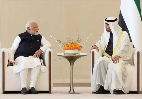  ?? AFP ?? President Sheikh Mohamed with Narendra Modi in Abu Dhabi during the Indian Prime Minister’s two-day visit to the UAE