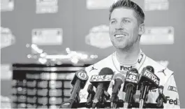  ?? JARED C. TILTON/GETTY ?? Denny Hamlin speaks with reporters during the Daytona 500 media day Wednesday.