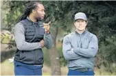  ?? JEFF GROSS/GETTY IMAGES ?? NFLer Larry Fitzgerald and actor Mark Wahlberg stand on the fifth tee at Monterey Peninsula Country Club, one of the courses in use for the Pebble Beach Pro-Am.