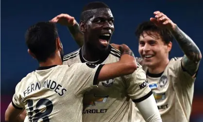  ??  ?? Paul Pogba celebrates scoring Manchester United’s third goal in their easy win over Aston Villa that boosts their hopes of finishing in the top four. Photograph: Shaun Botterill/Pool//EPA