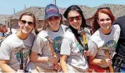  ?? [PHOTO PROVIDED] ?? Then Thunder Girls Molly, Sarah, Kei and Katie pitch in during the 2014 Central Oklahoma Habitat for Humanity Women Build. Members of the Thunder Girls squad will join the 2017 Women Build on Saturday, along with honorary chairman Christine Berney,...