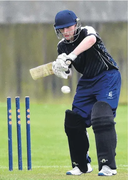  ?? PHOTO: GREGOR RICHARDSON ?? Tentative poke . . . North East Valley batsman Jack Pryde plays a shot during a match against Carisbrook­Dunedin/Kaikorai at Tonga Park No 2 on Saturday.