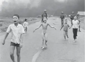  ?? NICK UT/THE ASSOCIATED PRESS FILE PHOTO ?? Far left, Nick Ut visits Kim Phuc in 1973, a year after the napalm attack, above. Left, the two are reunited at a June 2012 event in California.