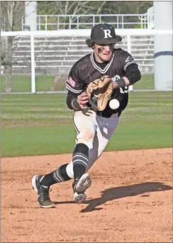  ?? Scott Herpst ?? Ridgeland shortstop Austyn Acuff moves to corral a grounder during a game last week at Heritage.