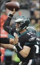  ?? AP PHOTO ?? Carson Wentz and the Philadelph­ia Eagles host Atlanta to open the 2018 NFL season.