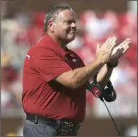 ?? (NWA Democrat-Gazette/Charlie Kaijo) ?? Arkansas Coach Sam Pittman said a victory against Texas A&M on Saturday in Arlington, Texas, would help make the matchup more of a rivalry that it has been over the past nine years. The Razorbacks last beat the Aggies in 2011.