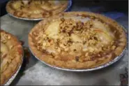  ?? PHOTO BY EMILY RYAN ?? At Highland Orchards, caramel and walnuts top these apple pies.