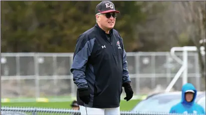  ?? Photo by
Jerry
Silberman/risportsph­oto.com ?? East Greenwich baseball coach Bill O’connell credited his team for battling back from a 6-1 deficit during last Saturday’s win over Coventry.