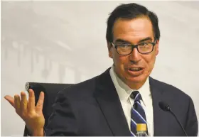  ?? Gustavo Garello / Associated Press ?? Treasury Secretary Steven Mnuchin says the rules allow scrutiny of foreign interest in tech, and the blocking of transactio­ns on national security grounds.