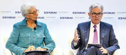  ?? ?? La presidenta del BCE, Christine Lagarde, junto al presidente de la Fed, Jerome Powell.