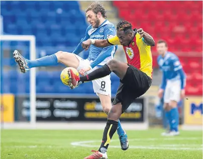  ?? Picture: SNS Group. ?? Murray Davidson challenges Partick’s Abdul Osman during Saturday’s Scottish Cup tie at McDiarmid Park.