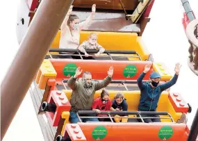  ??  ?? Thrillseek­ers wear masks while aboard the Jolly Rocker galleon.