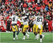  ?? Steven Branscombe/Getty Images ?? Iowa kicker Marhsall Meeder celebrates after his field goal beat Nebraska on Friday.