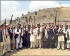  ??  ?? Afghans in Dur Baba vow to protect their villages from the Taliban a week before the attack (AFP/File).