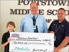  ?? SUBMITTED PHOTO ?? Pottstown Middle School student Matthew Zaborsky won $200 from the Foundation for Pottstown Education in its contest to name the quarterly newsletter. With him are Executive Director Joe Rusiewicz and middle school teacher David Maybry.