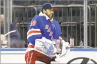  ?? Frank Franklin II / Associated Press ?? New York Rangers goaltender Henrik Lundqvist said he intends to fight to regain his position as the team’s No. 1 goaltender when the playoffs begin and he believes he can play “another few years” in the NHL.