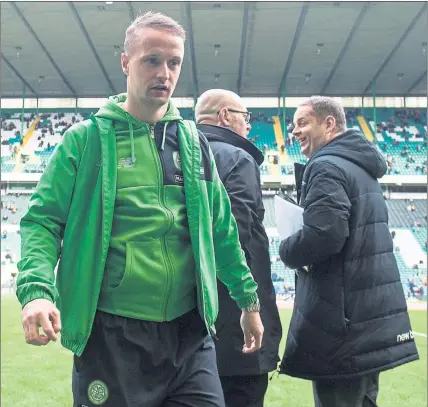  ?? Pictures: SNS ?? TOUGH AT THE TOP: Leigh Griffiths has struggled to cement his place in Brendan Rodgers’s (below) side.