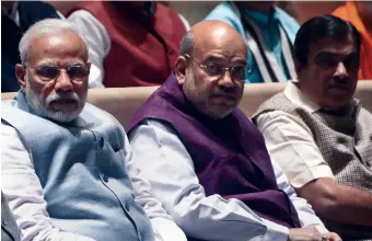  ?? — PTI ?? Prime Minister Narendra Modi, Union home minister Amit Shah and Union minister Nitin Gadkari at the BJP parliament­ary party meeting in New Delhi on Tuesday.