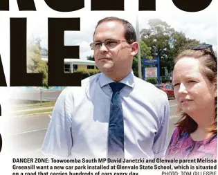  ?? PHOTO: TOM GILLESPIE ?? DANGER ZONE: Toowoomba South MP David Janetzki and Glenvale parent Melissa Greensill want a new car park installed at Glenvale State School, which is situated on a road that carries hundreds of cars every day.