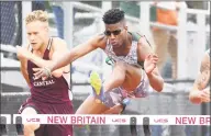  ?? Krista Benson / For Hearst Connecticu­t Media ?? Norwalk’s Katrell Clay, center, runs the 110 hurdles at the State Open Track Championsh­ips at Willow Brook Park in New Britain on Monday.