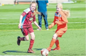  ??  ?? Dryburgh U/13 mount an attack against Letham (see main story).