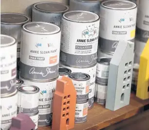  ?? STEPHEN M. DOWELL/ORLANDO SENTINEL ?? Cans of Annie Sloan Chalk Paint are lined up on a shelf at Adjectives Market.