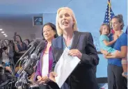  ?? J. SCOTT APPLEWHITE/ASSOCIATED PRESS ?? Sen. Kirsten Gillibrand, D-N.Y., with Sen. Mazie Hirono, D-Hawaii, left, speaks to reporters in support of Christine Blasey Ford during a Thursday news conference.