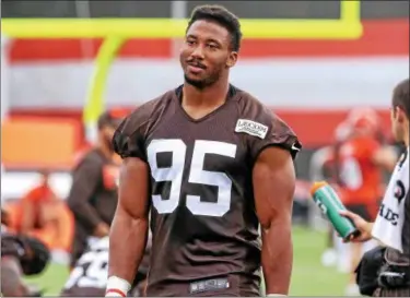  ?? THE MORNING JOURNAL FILE ?? Myles Garrett watches the Browns during training camp on July 28 in Berea.