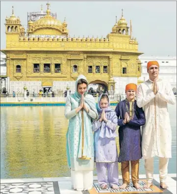  ?? HT PHOTO ?? ■ AT GURU’S ABODE Canadian Prime Minister Justin Trudeau with his wife Sophie Gregoire Trudeau, their son Xavier and daughter EllaGrace after paying obeisance at the Golden Temple in Amritsar on Wednesday.