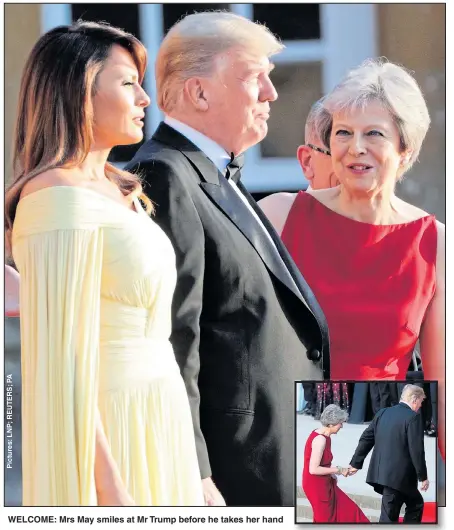  ??  ?? WELCOME: Mrs May smiles at Mr Trump before he takes her hand