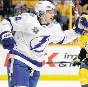  ?? AP PHOTO ?? Tampa Bay Lightning’s Chris Kunitz celebrates after scoring a goal against the Nashville Predators in the first period of Tuesday night’s NHL game in Nashville, Tenn.