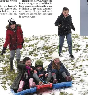  ?? Photo by Michelle Cooper Galvin ?? Milly Spillane, Fionn and Cora O’Donovan withPhoto by Michelle Cooper Galvin(back) Jack Spillane and Ryan Shanahan enjoying their sleigh at Lackabane, Fossa, Killarney on Friday. Bébhinn, Réailtin and Muireann O’Donoghue with their Harry Potter Snowman...