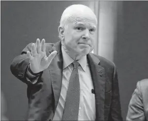  ?? AP PHOTO ?? In this June 3, 2016, file photo, Sen. John McCain, R-Ariz., greets the audience as he arrives to deliver a speech in Singapore.