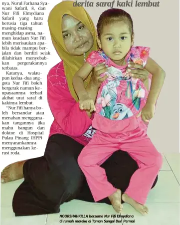  ??  ?? NOORSHAHKI­LLA bersama Nur Fifi Elmydiana di rumah mereka di Taman Sungai Duri Permai.