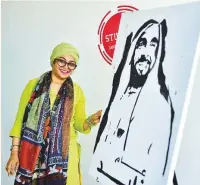  ?? Clint Egbert/Gulf News ?? Microbiolo­gist-turned-artist Reshma Sainulabde­en with her artwork dedicated to the Year of Zayed at her studio.