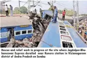  ??  ?? Rescue and relief work in progress at the site where Jagdalpur-bhubaneswa­r Express derailed near Kuneru station in Vizianagar­am district of Andra Pradesh on Sunday