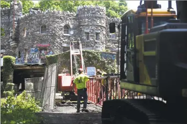  ?? Brian A. Pounds / Hearst Connecticu­t Media ?? Work begins on abatement of the Hearthston­e Castle historic site on Brushy Hill Road in Danbury on Monday.