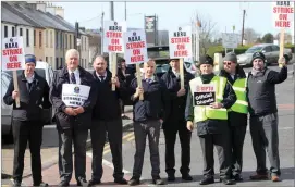  ??  ?? Striking bus drivers on the picket line at MacDiarmad­a Station in Sligo. Pic: Carl Brennan.