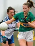  ??  ?? Kerry’s Eilish O’Leary runs clear of Muireann Atkinson