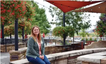  ??  ?? Odell Brewing Co.’s Kailey Bowser said the brewery’s cool patio is hopping in warm weather.