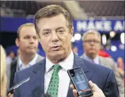  ?? MATT ROURKE / AP ?? Former Trump campaign chairman Paul Manafort talks to reporters in July at the Republican National Convention in Cleveland.